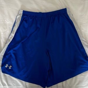 Men’s Under Armour athletic shorts in blue. 20.5”L. Size L.